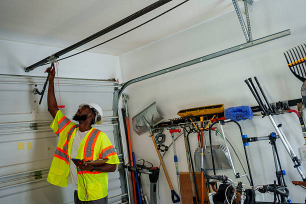Professional Garage Door Panel Replacement technician working in St. James, NY